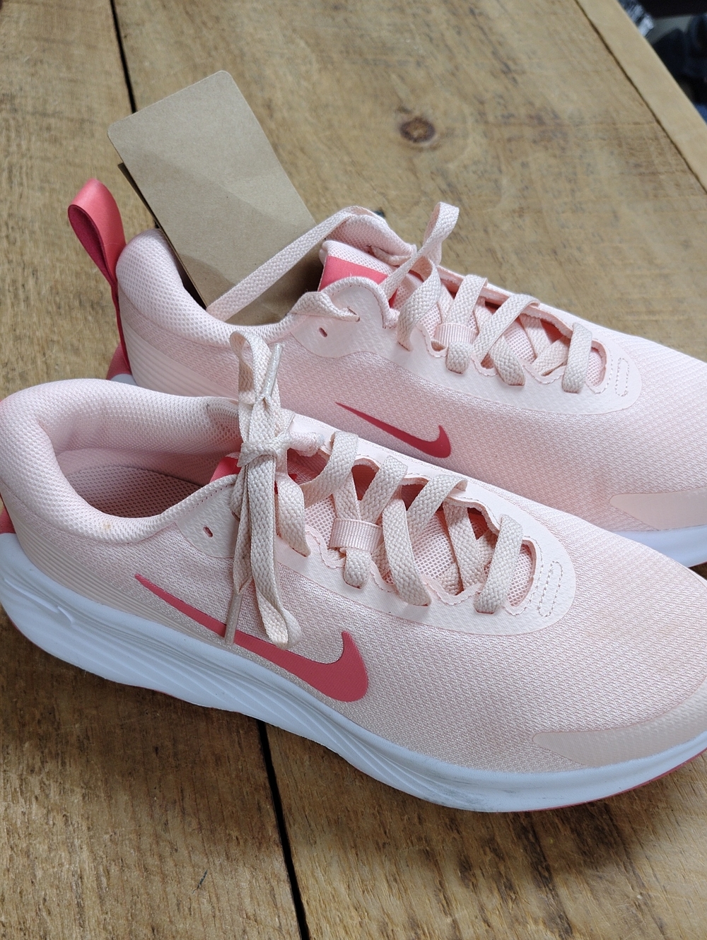 Nike Women's Light Pink Athletic Sneakers with Coral Swoosh